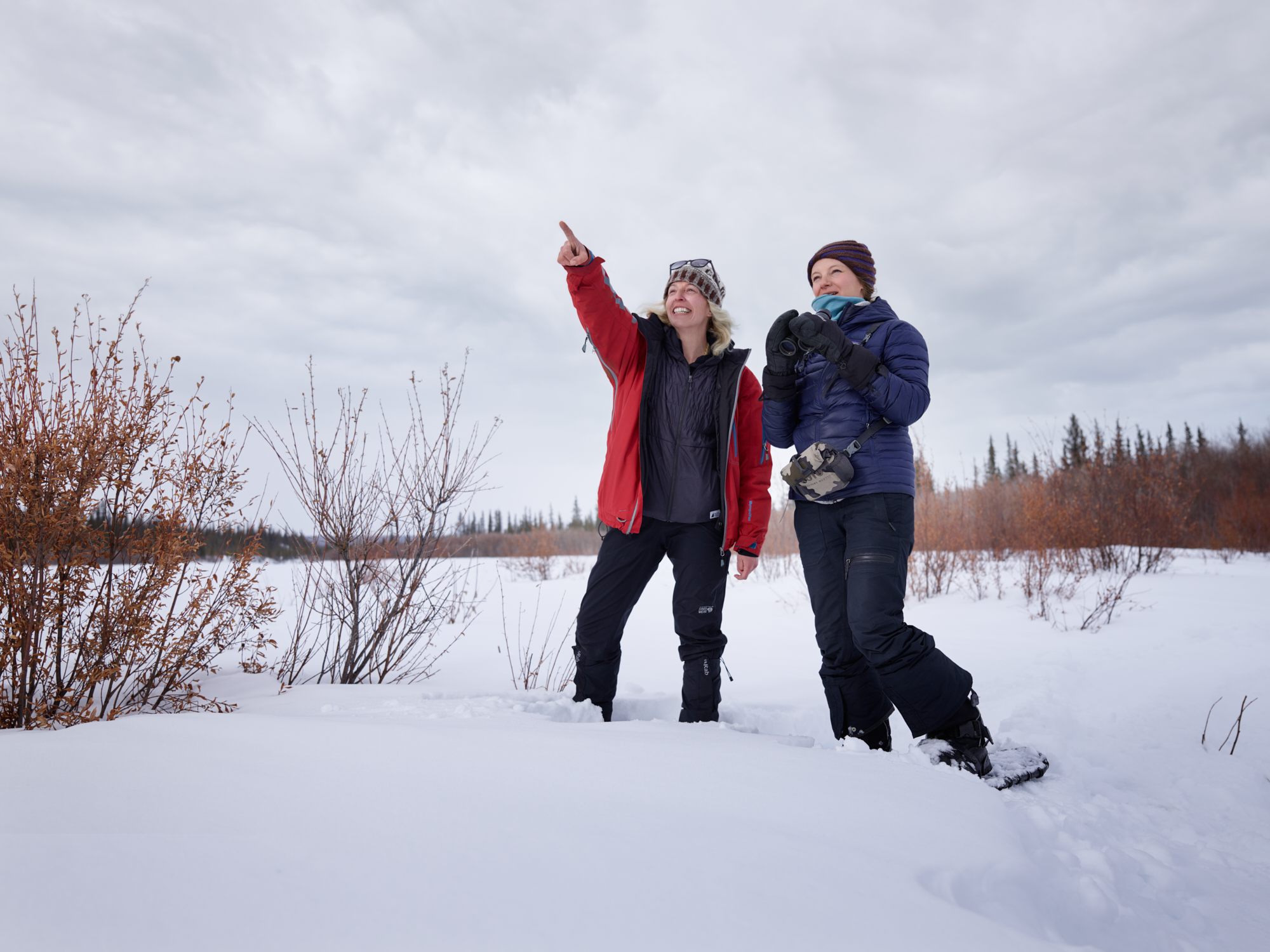 Students bird watching in the snowy spring of Old Crow