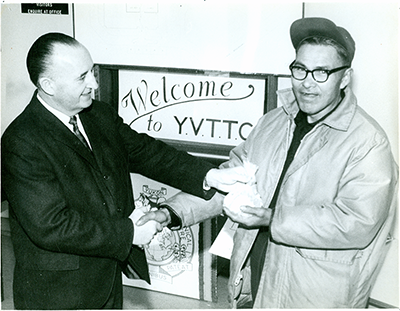 Chief Elijah Smith receiving a prize.