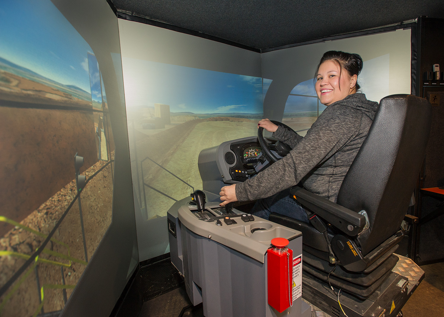 student in heavy equipment operator simulator