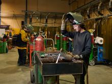 a woman welding